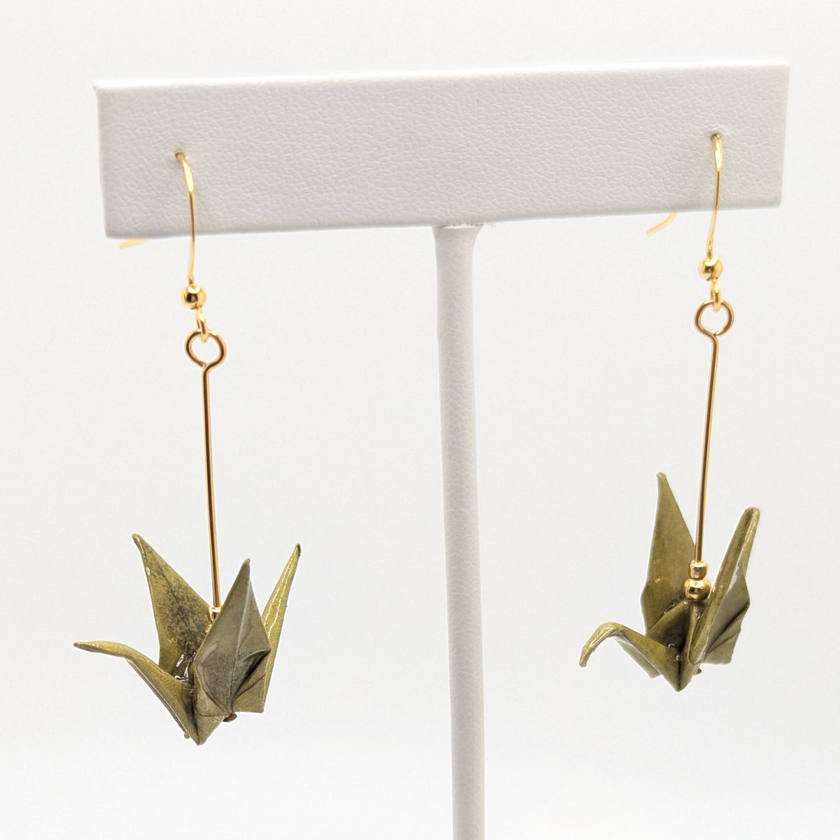 Mottled Olive Origami Crane Earrings, close-up of the pair