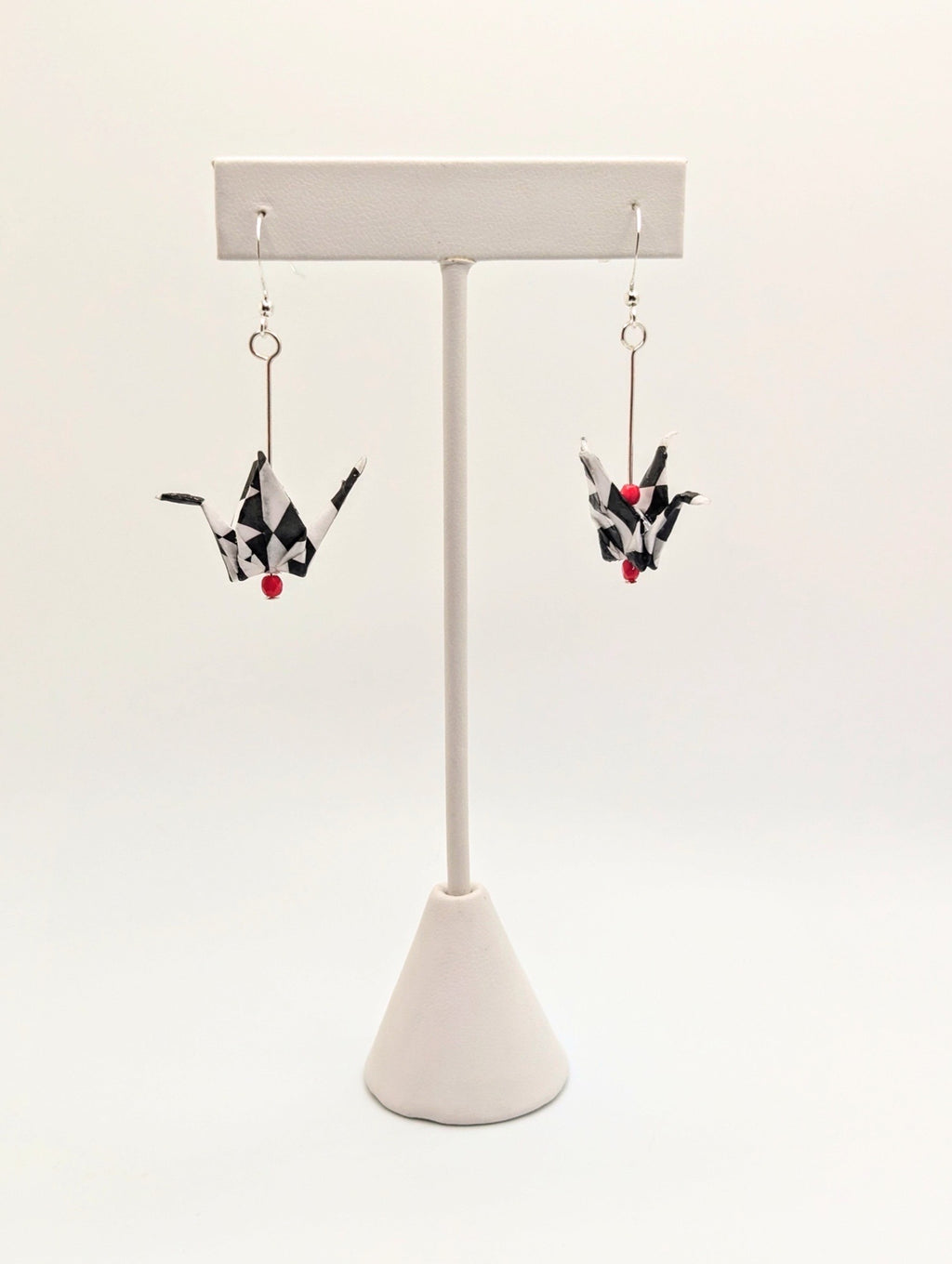 Harlequin Pattern Chiyogami Origami Crane Earrings, shown with silver ear wires