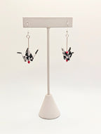 Harlequin Pattern Chiyogami Origami Crane Earrings, shown with silver ear wires