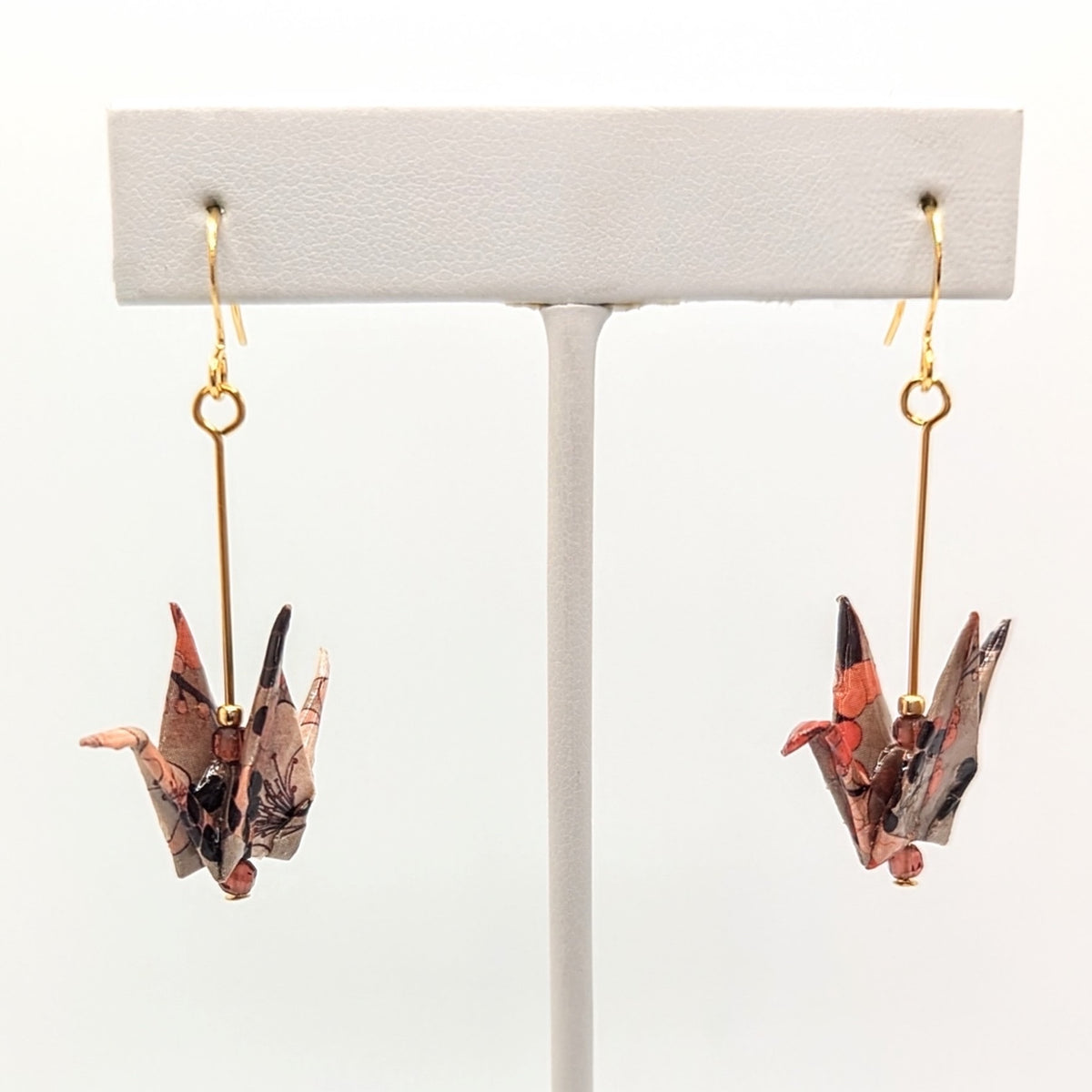 Beige Floral, Hessonite Garnet Origami Crane Earrings, close-up of the pair